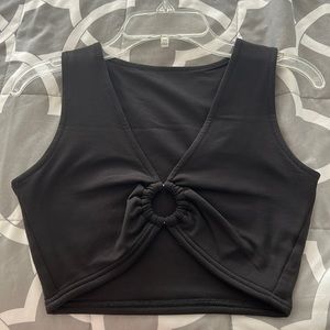 Black cropped shirt. Good material and has never been worn.